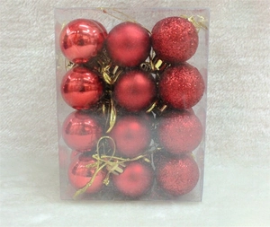 Detail of 3cm red Christmas ball ornaments in matte, glossy, and glitter finishes