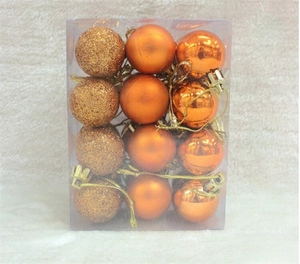 Detail of 12-piece antique copper Christmas ball ornaments with glitter and matte finishes