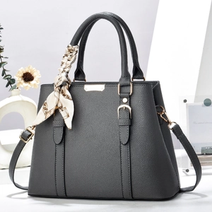 Deep grey litchi leather tote bag with elegant silk scarf and golden metal hardware