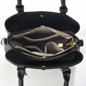 Vertical view of black PU leather tote interior with multiple compartments and gold zippers