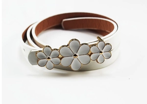 Detailed view of white PU leather belt featuring elegant gold-trimmed floral buckle