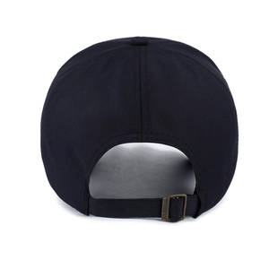 Rear view of black cotton baseball cap with adjustable antique bronze metal buckle