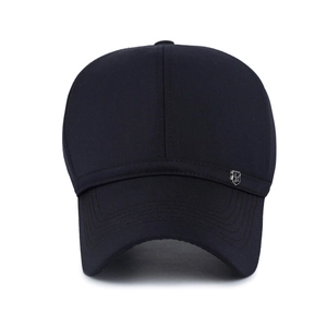 Classic cotton baseball cap with a small silver shield logo on a plain dark fabric