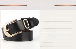 Detail view of high-quality black leather belt with a polished gold pin buckle for women