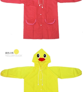 Detail of kids yellow duck raincoat with cartoon 3D hood and red waterproof poncho