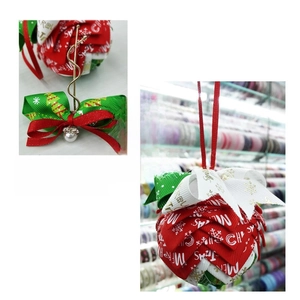 Detailed Christmas ribbon ornament with red and green bow and hanging pearl charm