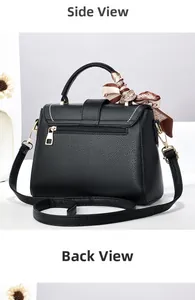 Detail view of black lychee grain crossbody bag with gold hardware and silk scarf decor