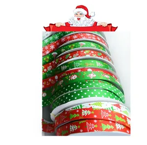 Detail view of assorted Christmas grosgrain ribbons with festive patterns and colors