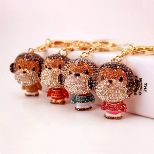 Cute monkey keychain with colorful rhinestones in gold, red, blue, and pink finishes