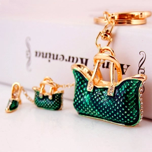 Creative green handbag keychain with white rhinestones and matching high heel charm