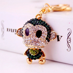 Creative cute crystal monkey keychain with gold hardware and sparkling green rhinestones