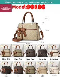 Detail view of the 27x10x21cm tote bag showing PVC monogram texture and bow charm