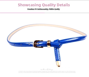 Detailed macro of bright royal blue patent leather belt with a golden horseshoe buckle