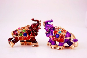 Macro shot of colorful rhinestone elephant keychains with glossy enamel and alloy finish