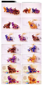 Collage of colorful crystal elephant keychains with enamel finish and gold metal base