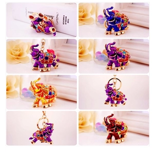 Detail of elephant keychains with colorful crystals and enamel finish in multiple views