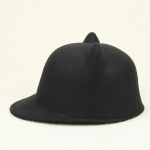 Detail of cute cat ears on a black felt equestrian hat for children and adults