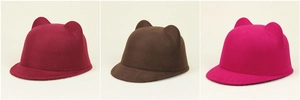 Detailed view of children's felt hats with cat ears in burgundy, dark brown and rose red