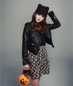 Close-up of a stylish black felt equestrian hat featuring cute cat ear design details