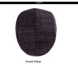 Top view of deep grey plaid flat cap showing premium wool texture and fabric detail