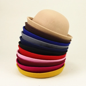 Classic wool felt bowler hat in ten vibrant colors with a stylish rolled brim for winter