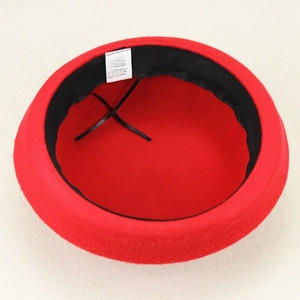 Red wool blend dome hat with adjustable inner strap and premium felt texture