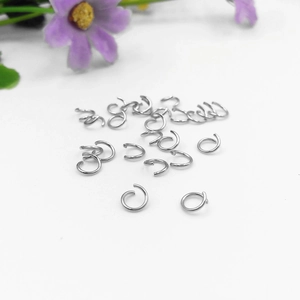Macro shot of silver stainless steel oval jump rings for DIY jewelry making and crafts
