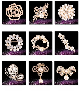 Detailed grid of nine elegant pearl and rhinestone flower brooches in gold finish