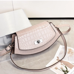 Pink crocodile pattern shoulder bag with metallic twist lock and elegant top handle