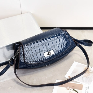 Deep blue crocodile embossed patent leather crossbody bag with silver rotating lock