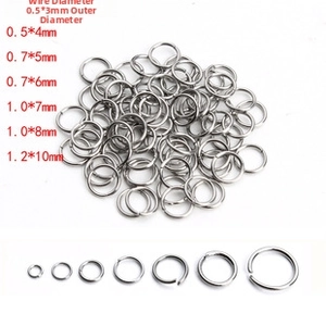 Detail view of seven sizes of gold screw clasps for DIY necklace jewelry making