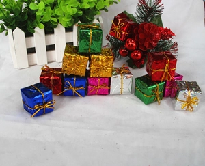 Colorful 2.5cm laser foil mini gift boxes for Christmas tree decoration on white cloth