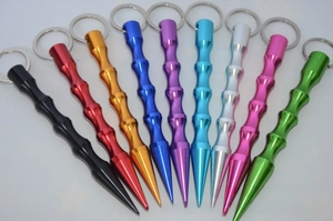Nine colors of aluminum kubotan keychains with anti-slip grip and pointed tip for safety