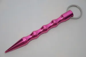 Close-up of pink aluminum tactical keychain with wave-shaped ergonomic grip and pointed tip