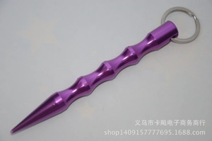 Detail of purple aluminum kubotan self-defense keychain with textured grip and ring