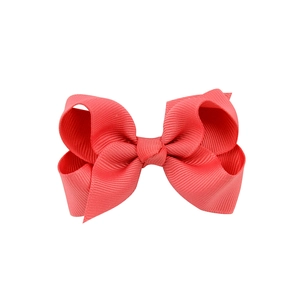 Handmade coral pink grosgrain ribbon bow hair clip for children with ribbed texture