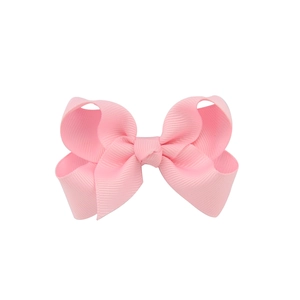 Charming pink grosgrain ribbon bow hair clip for girls with elegant fabric texture