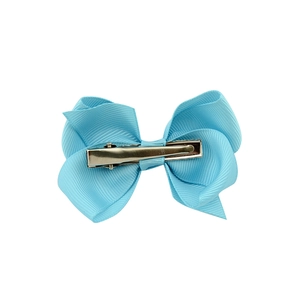 Light blue grosgrain ribbon bow hair clip with silver metal alligator clip on white background