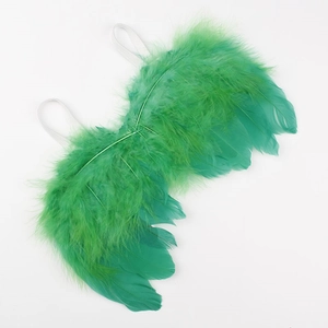 Detailed view of green angel feather wings for infant photography with elastic straps