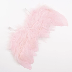 Detailed view of pink feather angel wings for babies with elastic straps for photography