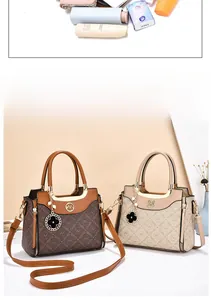 Detailed view of spacious monogram tote bag interior holding umbrella and cosmetics