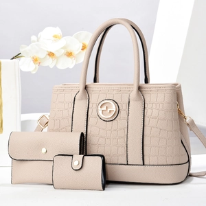 Beige faux leather tote bag set with crocodile embossing and golden metal hardware