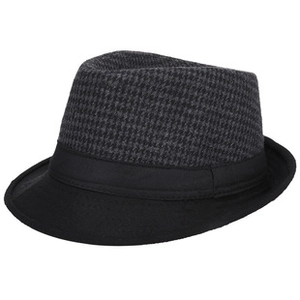 Dettaglio del motivo pied-de-poule grigio e trama in lana nera sul cappello fedora retrò