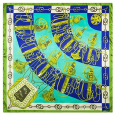 Detailed pattern of blue and green silk scarf with golden sword handles and chain borders
