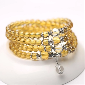 Elegant multi-layer yellow and amber glass beaded bracelet with silver metal spacer beads