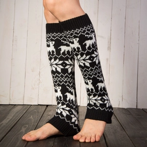 Knitted reindeer and snowflake leg warmers in black and white Nordic jacquard style