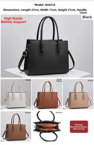 Estructura interna y colores del bolso de piel Saffiano con tres compartimentos útiles