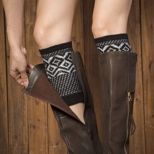 Bohemian knit leg warmers with black and white geometric patterns for autumn boots