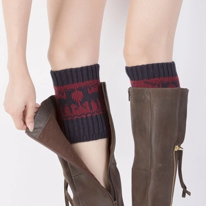 Knitted Christmas leg warmers with reindeer pattern in navy and wine red color
