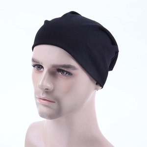 Classic black knitted slouchy beanie for men and women shown on a head mannequin